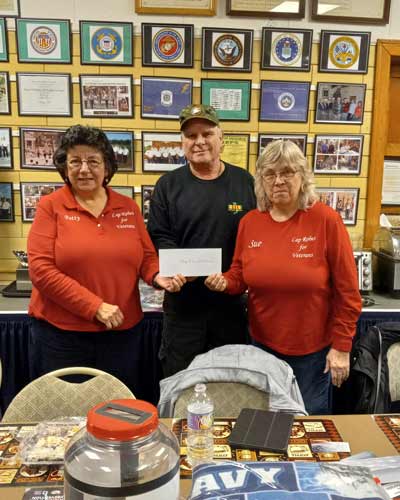 Check presentation Lap Robes for Veterans -Pat Verhagen & Sue Morris